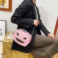 Nouveauté Sac à main bandoulière rose mignon avec chaîne, motif citrouille Jack-O'-Lantern et ailes de chauve-souris, idéal pour les fêtes d'Halloween, vente en gros pour femmes