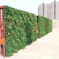 Panneau de fausse herbe 3D Mur de haies vertes artificielles Plante verte artificielle Clôture murale d'herbe verte Panneau mural de plantes artificielles