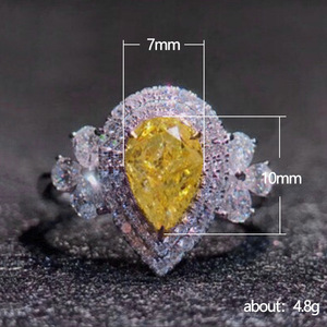 Bague de fiançailles en zircone cubique en forme de poire pour femme, bande luxueuse entièrement pavée de pierres précieuses jaunes simulées avec un style élégant - Product Image 5