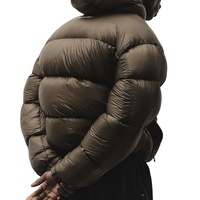 Manteau d'hiver en duvet pour hommes nouvelle mode manches amovibles épaissie imperméable coupe-vent couleur assortie veste à capuche bouffante
