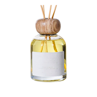 Bouteille diffuseur de parfum en verre rond de luxe personnalisée 100ml 150ml, en stock, vide, avec bouchons à vis en bois