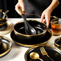 Service de table en céramique noir mat de luxe nordique, bols et assiettes à bord doré, vaisselle avec boîte cadeau pour mariage et maison