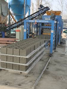 Machine de fabrication de blocs creux en béton vibré Machine à briques à verrouillage automatique en Jamaïque, Malawi - Product Image 2