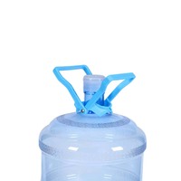 Poignée de levage multifonctionnelle pour bouteilles de grande capacité