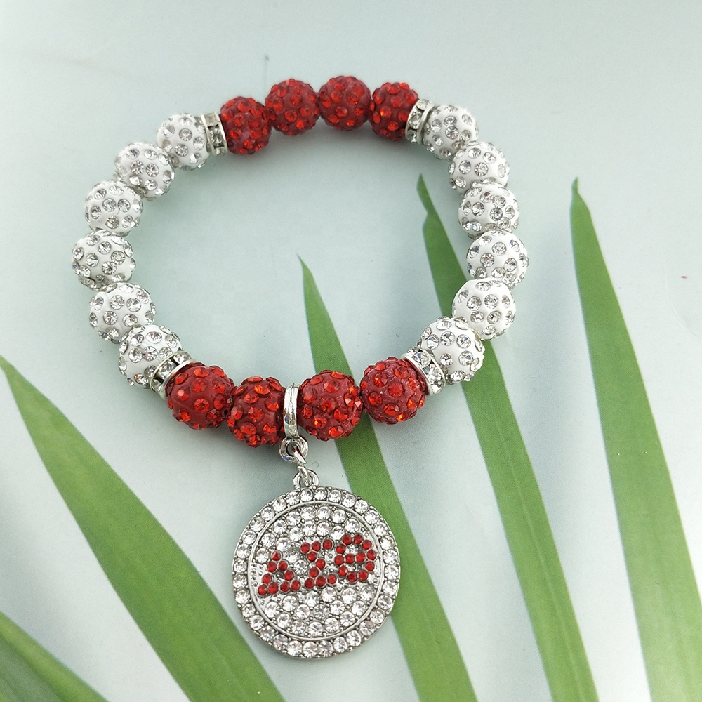 Pulsera roja con pedrería.