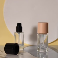 Botol pompa Foundation Serum kaca silinder transparan, mewah untuk krim rias wajah maskara pembersih wajah masker wajah