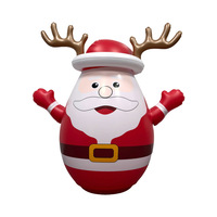 Tumbler gonflable en PVC épaissi Père Noël avec jeu de lancer d'anneaux pour jeu interactif parent-enfant