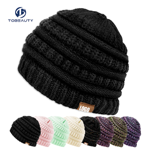 Sombreros de <span class=keywords><strong>invierno</strong></span> acanalados de punto de cable sólido de fábrica para mujer Beanie acrílico cálido sombrero de cubo de punto <span class=keywords><strong>gorro</strong></span> de ganchillo de lujo - Product Image 1