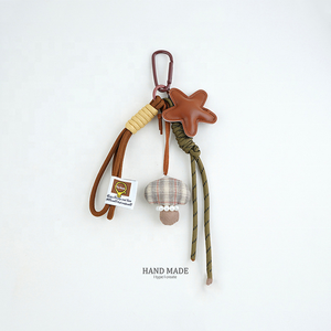 Llavero de cuero tridimensional Lucky Star, colgante para bolso de pareja, llavero de goma tejido de alta gama para Año Nuevo - Product Image 3