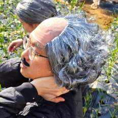 Peluca Calvo de pelo rizado para un estilo y comodidad únicos - Product Image 1