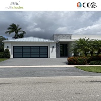 Porte de garage en verre sans cadre à ouverture automatique, design moderne, multi-panneaux, avec fonction coupe-vent et surface finie
