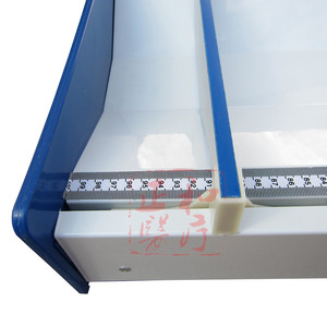 Cama electrónica para medir la altura y el peso de bebés con bandeja de báscula, forma rectangular, funciona con pilas recargables. - Product Image 4