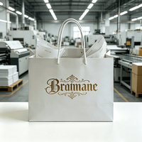 Sac shopping en papier blanc de luxe avec logo estampé or et poignée en corde torsadée pour bijoux, mariage, boutique, emballage cadeau de marque