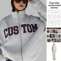 Sweat-shirt col montant style universitaire respirant personnalisé ODM OEM en tissu éponge décontracté avec lettres brodées sur le devant pour femme