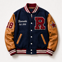 Blouson universitaire oversize avec logo brodé en chenille découpé au laser, coupe ample, manches en cuir, corps en laine, style Letterman
