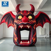 Arche gonflable personnalisée en forme de tête de démon pour Halloween, idéale pour la décoration publicitaire d'événements en extérieur et de zones scéniques