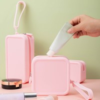 Organisateur de maquillage de voyage en silicone personnalisé pour femmes sac de rangement cosmétique à fermeture éclair étanche sacs de maquillage portables