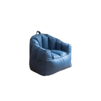 Fauteuil canapé enfant monoplace compressible, multicolore, adapté à plusieurs espaces tels que les salons et les bureaux.