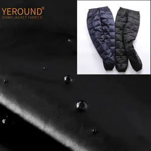 100% Nylon impermeable 20D fibra sin recubrimiento esponjoso ligero a prueba de agua hombre y mujer abajo pantalones tela