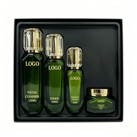 Ensemble de soins du visage hydratant et éclaircissant 4 en 1, sérum, crème, beurre de karité, vitamine E, flacons en verre vert luxueux, kit de soins de la peau OEM