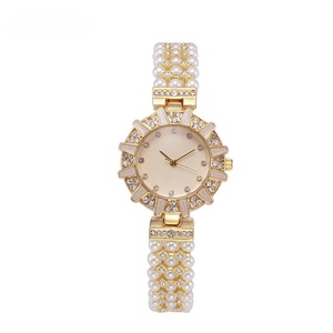 Prix de gros d'usine - Montres classiques pour femmes les plus vendues avec diamants sertis de roses, montres élégantes et de haute qualité - Product Image 1