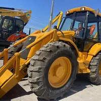 Chargeuse-pelleteuse JCB 4CX d'occasion, importée, modèle 2023, moteur 74 kW, pompe, charge nominale 7,5 tonnes, poids de la machine 7500 kg, en stock