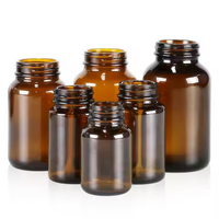 Bouteille de médecine en verre ambré pharmaceutique de 60ml contenant de capsules à large ouverture avec bouchon à vis en aluminium pour perfusion