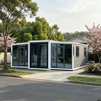 Conteneurs de transport pliables de haute qualité avec mur-rideau en verre pour maisons préfabriquées, pièce pliante à double aile avec toilettes