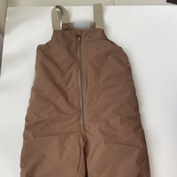 Vente en gros de vêtements pour enfants Vêtements d'hiver pour enfants Combinaison imperméable à l'eau Bretelles pour garçons et filles Salopette de neige épaisse et solide