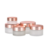 Emballage cosmétique vide OEM en verre givré transparent mat avec couvercle rose doré pour crème pour le visage
