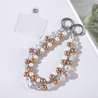 Dragonne de luxe portable et durable en alliage de zinc et plastique, ornée de perles de cristal, avec double chaîne, pour téléphone portable, porte-clés, étui de sac et dragonne de poignet