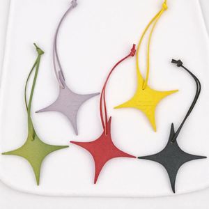 Wholesale Four-point Star PU Leather <b>Charm</b> Colorful <b>Bag</b> Pendant Star Shape Candy Color <b>Bag</b> Pendant Car Accessories - Product Image 1