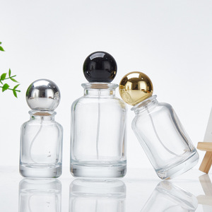 Botella de Perfume de Vidrio con Tapa de Bola Cilíndrica, en Stock, Venta al por Mayor, Botella Portátil de Moda para Dispensar Perfume, para Uso Cosmético - Product Image 1
