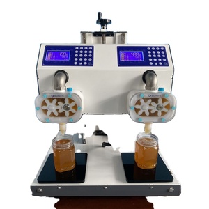 Nouvel équipement apicole 2023 : Machine de remplissage de miel à deux têtes pour bouteilles - Product Image 3