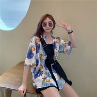 Blouse d'été florale ample style rétro occidental, inspiration Hong Kong, décontractée et respirante en polyester à manches courtes – Vente en gros