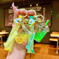 Porte-clés personnalisé en sable liquide coloré pour femmes, mignon pendentif en forme de sucette, bouteille à dérive, petite poupée pour sac à dos, cadeau