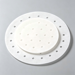 Papier de cuisson rond perforé jetable, écologique, de qualité alimentaire, antiadhésif, en silicone, pour la cuisson des raviolis et des pains. - Product Image 1