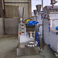 Machine entièrement automatique pour la fabrication de Kubba, Xiao Long Bao, pains vapeur, Momo népalais, Siomai, Baozi et Mochi