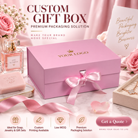 Boîte cadeau magnétique rose avec poignée en ruban, emballage rigide pliable personnalisé pour vêtements et e-commerce