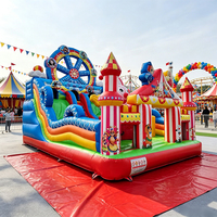 Château gonflable géant sur le thème du cirque de carnaval, style grande roue, avec toboggan pour événements