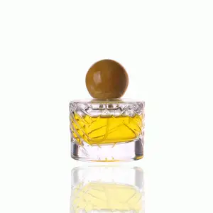 现代奢华风格纹理透明圆筒厚壁50毫升玻璃香水喷雾瓶，带黄色树脂盖