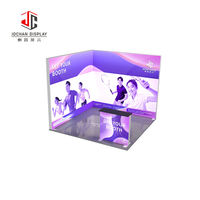 Stand d'exposition personnalisé en tissu tendu avec bannière extensible, comptoir et structure modulaire en aluminium pour salons professionnels