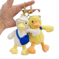 En gros : Jouets en peluche canard avec lunettes, petits jouets en peluche Kawaii, poupées en peluche douces, pendentifs de sac, accessoires de mode, porte-clés en peluche