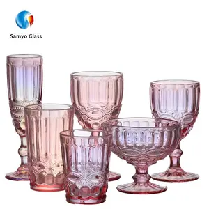 China Suppliers 2023 Solid Color Embossed Retro Vintage Blue Pink Red Wine Goblet Glass For Wedding