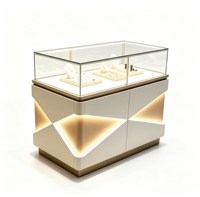 Comptoir de présentation de bijoux moderne blanc verrouillable avec éclairage LED pour attirer les clients dans les boutiques de détail
