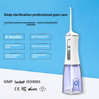 Hydropulseur dentaire portable d'usine OEM avec 4 modes de nettoyage, indice IPX7, 1800ppm, réservoir amovible de 300ml, pour marque privée