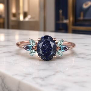 Anillo de Plata de Ley 925 Chapado en Oro Rosa con Piedra Arenisca Azul, Corte Ovalado con Detalles de Hojas Marquise, Diseño de Racimo Impresionante - Product Image 2