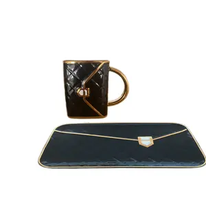 Ensemble tasse et soucoupe en céramique en forme de sac de 310ml avec logo personnalisé tasse à thé et à eau pour la maison tasses à café créatives intéressantes avec cuillère