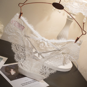 Braguitas de mujer sin costuras de elastano/poliéster con control medio, sexy, con encaje bordado, de talle bajo, con diseño cruzado hueco y transparente - Product Image 3