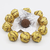 Confiseries au chocolat aux miettes de biscuits, chocolats en boules dorées en gros de l'usine de chocolat, en boîte